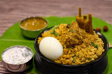 Premium Photo | High angle view of mutton biryani served with raita