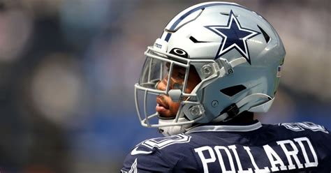 WATCH: Tony Pollard leaves locker room on crutches with leg cast after ...