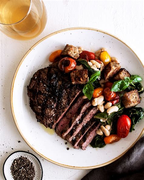 Peppercorn Crusted Rib Eyes With Burst Tomato Panzanella The Original