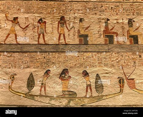 Drawings and hieroglyphs on the walls of the tomb of Ramses IX in the Valley of the Kings near ...