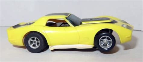 Aurora Afx Magnatraction Chevy AP Corvette Yellow Black HO Slot Car