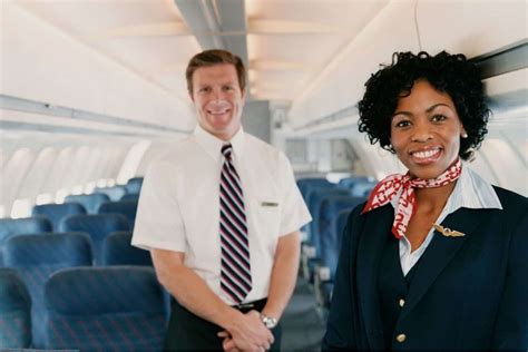 The Surprising Reason Why Flight Attendants Sit On Their Hands