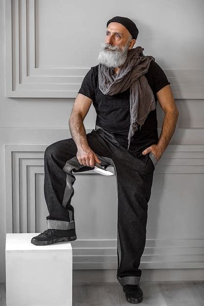 Premium Photo Brutal Man Indoors In Red Eyeglasses Stylish Old Man