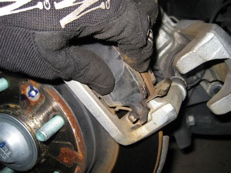 Replace Rear Brakes On Ford Fusion