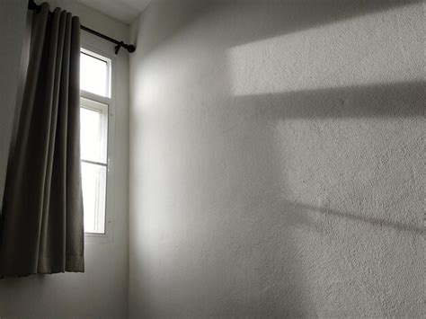 Premium Photo Sunlight Falling On Wall Of House