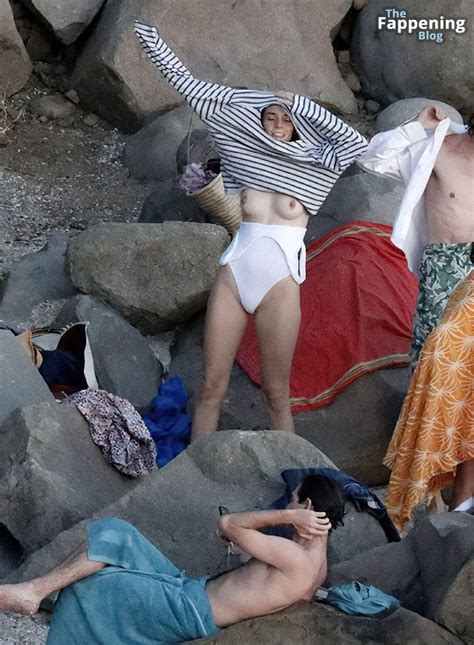 Maya Hawke Flashes Her Nude Tits Sexy Body In A White Swimsuit On The Beach In St Barths 42