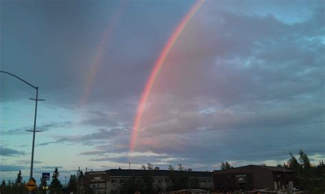 Double Rainbow ACROSS THE SKY!!! right after I landed in Fairbanks the rainbow looks like its ...