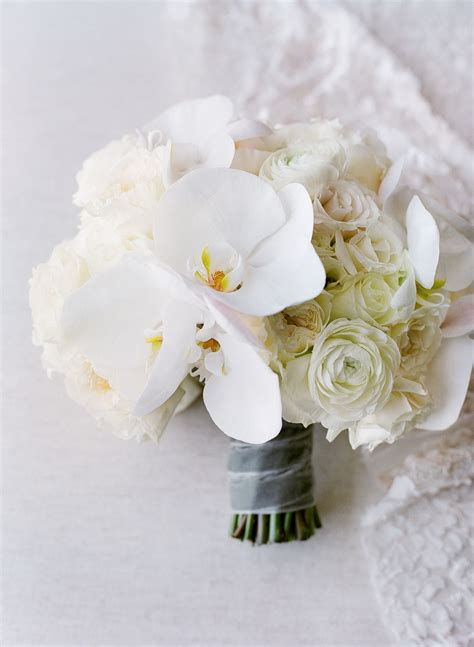 Elegant White Bouquet with Orchids and Roses