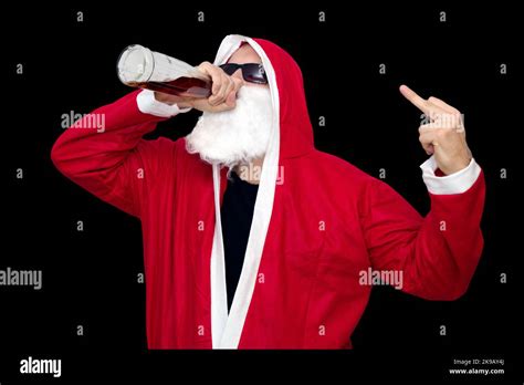 Bad Santa Claus With Bottle Of Alcohol On Black Backround With Middle