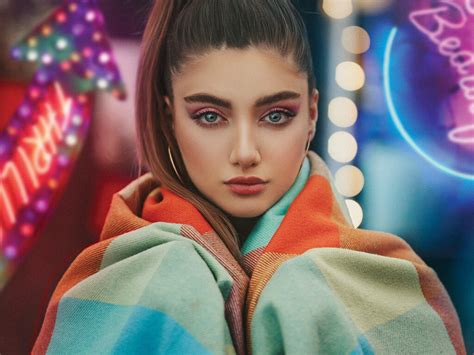 Portrait Of Pretty Blonde Model Sitting On Table B Z Services Indian Exporting Company