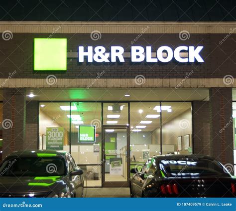 H&R Block Tax Company at Night Editorial Stock Image - Image of dues, taxes: 107409579