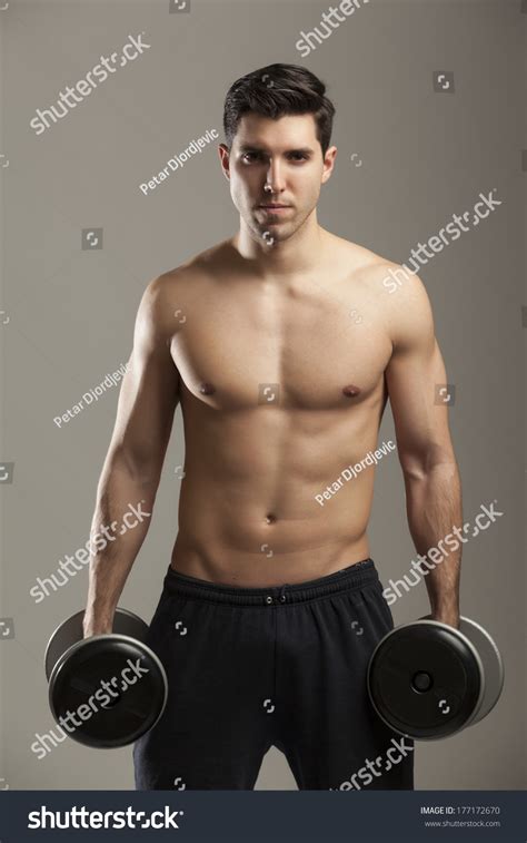Man Lifting Dumbbells Hal Naked On Stock Photo Shutterstock