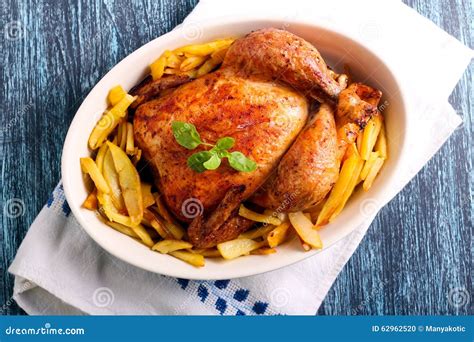 Roast Chicken And Potato Chips Stock Photo Image Of Rustic Grill