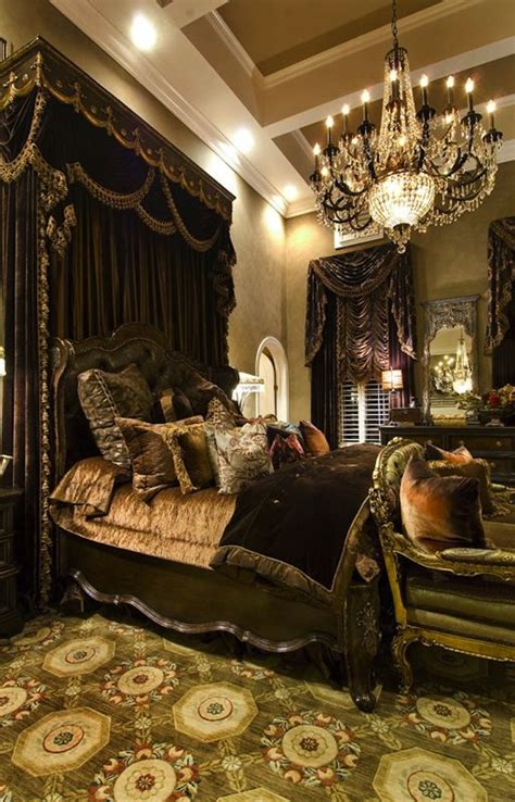 A Fancy Bedroom With An Ornate Bed And Chandelier