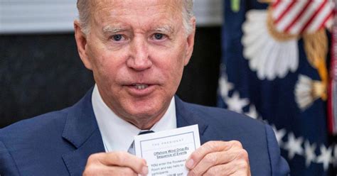 President Joe Biden Accidentally Shows Reporters Cheat Sheet