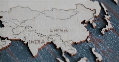 Close-up of Countries on Wooden Map · Free Stock Photo