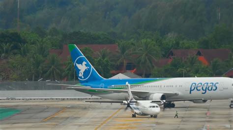 PHUKET THAILAND DECEMBER 2 2016 Bangkok Airways ATR 72 Towing And