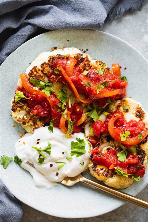 Vegan Cauliflower Steaks With Tomato Sauce Earth Of Maria