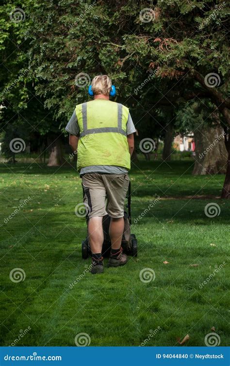 Gardener With Lawn Mower In A Public Garden Editorial Image Image Of