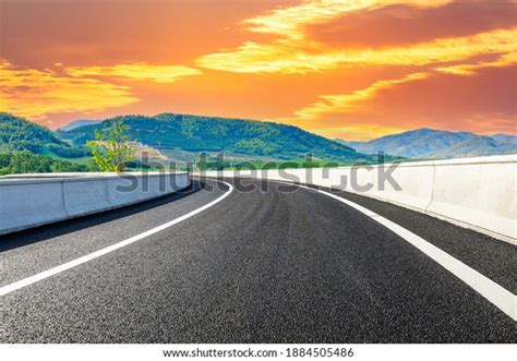 Asphalt Road Mountain Sunsetroad Mountain Background Stock Photo