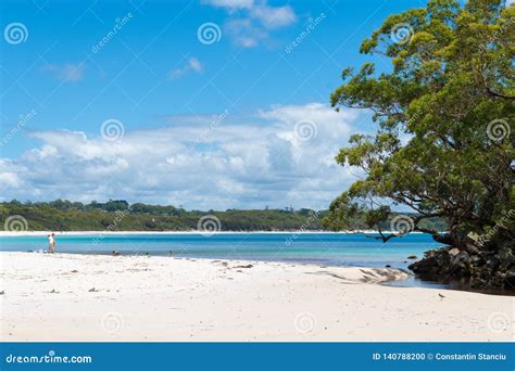 People Enjoying The Sunny Weather At Galamban Green Patch Beach In