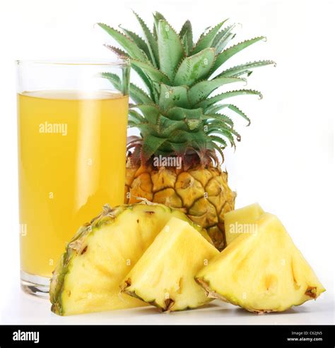 Pineapple Juice In A Glass Of Pineapple Slices Image On White