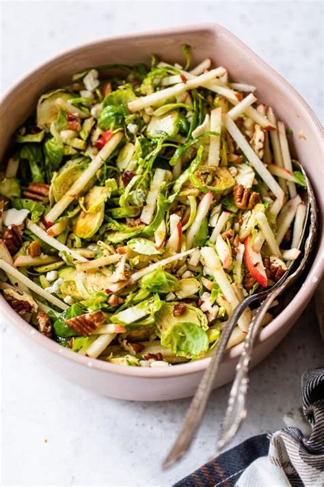 Fall Brussels Sprout Salad With Apples Pecans And Blue Cheese