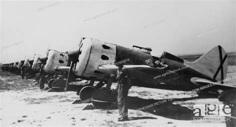 A Parked Formation of Polikarpov I-16 Ratas During the Spanish Civil War with Pilot Standing in ...