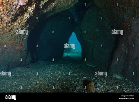 Inside A Cave Underwater With The Exit In Background Mediterranean Sea