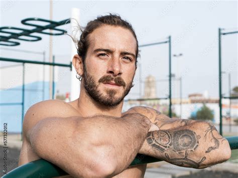 Caucasian Calisthenics Athlete Portrait With Long Hair And Beard