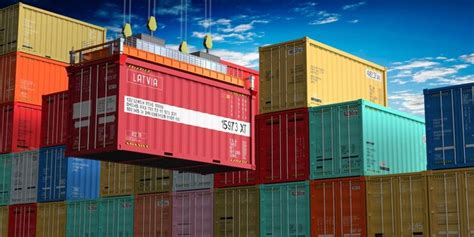 Premium Photo | Freight shipping container with flag of Latvia on crane ...