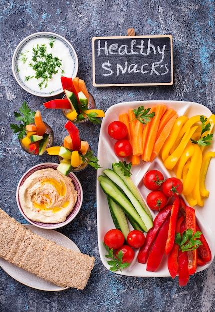 Premium Photo | Healthy snacks. vegetables and hummus