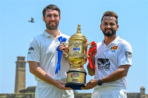 Andy Balbirnie And Dimuth Karunaratne Pose With The Trophy