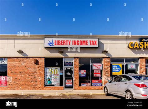 The Storefront Of An Income Tax Preparation Business Called Liberty