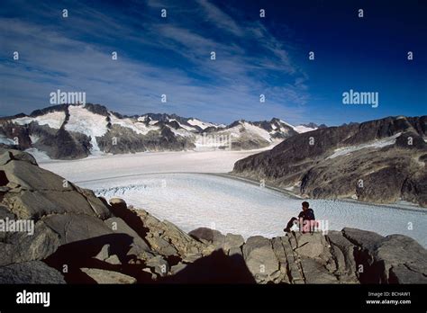 Hiker Sitting Rocks Juneau Ice Field Mendenhall Southeast Alaska