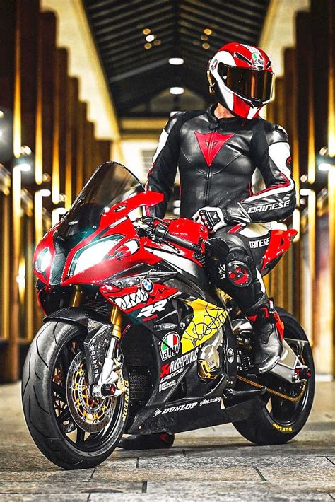 Biker Wearing A Super Cool Agv Pista Gp R Motorcycle Helmet Dainese