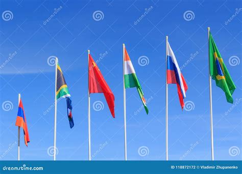 Flags Of BRICS Countries On A Blue Sky Background Stock Photo - Image ...