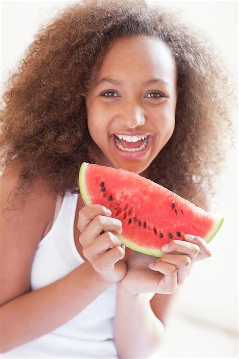 Teenage Girl Eating Watermelon Photograph By Ian Hooton Science Photo