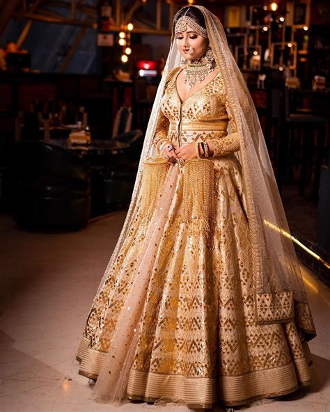 Pin By Dulhaniyaa Indias First 360 On Golden Lehenga Golden Bridal