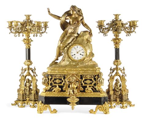 A FRENCH LARGE BLACK MARBLE ORMOLU AND BRONZE STRIKING MANTEL CLOCK