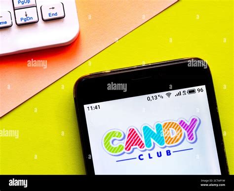 In This Photo Illustration A Candy Club Logo Is Seen Displayed On A