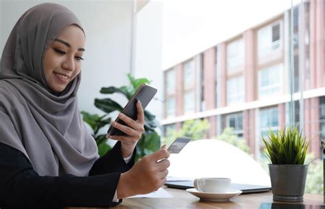 Premium Photo Beautiful Young Muslim Woman With Hijab Sits At Her