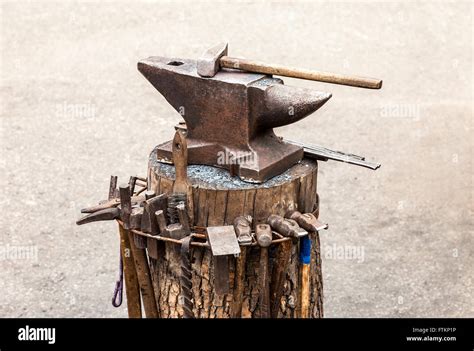 Old Anvil With Blacksmith Tools At The Outdoors Stock Photo Alamy