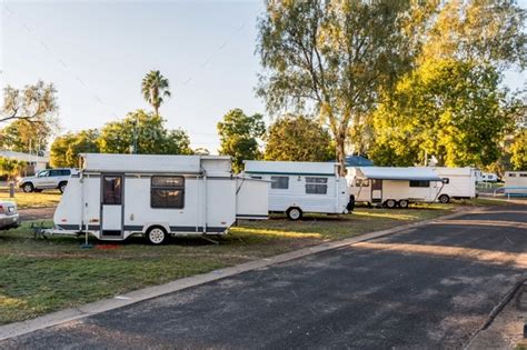 Various RV caravans camping on campsites at the caravan holiday park ...