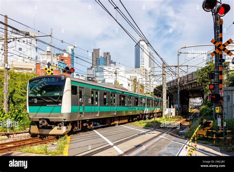 Japan Rail Jr East Regional Train On The Saikyo Line Near Yoyogi In