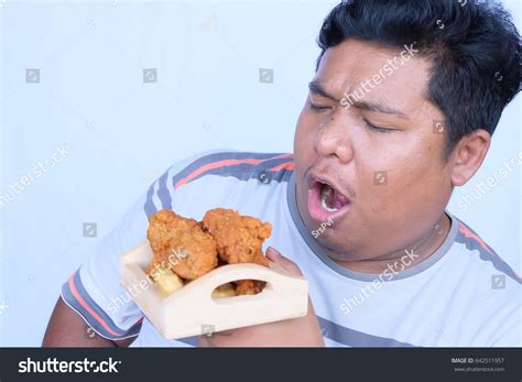 Asian Man Eat Fried Chicken Stock Photo 642511957 Shutterstock