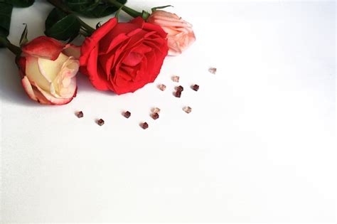 Premium Photo Red Pink And White Pink Roses And Beads On White Top