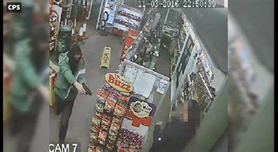 Moment Masked Robber Sprayed Shop Worker With Petrol On CCTV BBC News