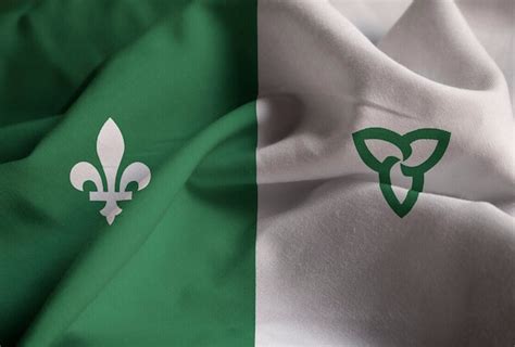 Premium Photo | Ruffled flag of franco ontarian