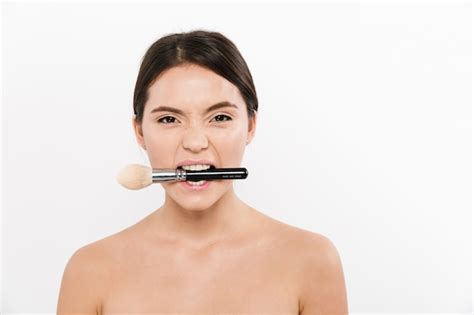 Premium Photo Studio Portrait Of Cheerful Asian Woman Being Half Naked And Makeup Brush In